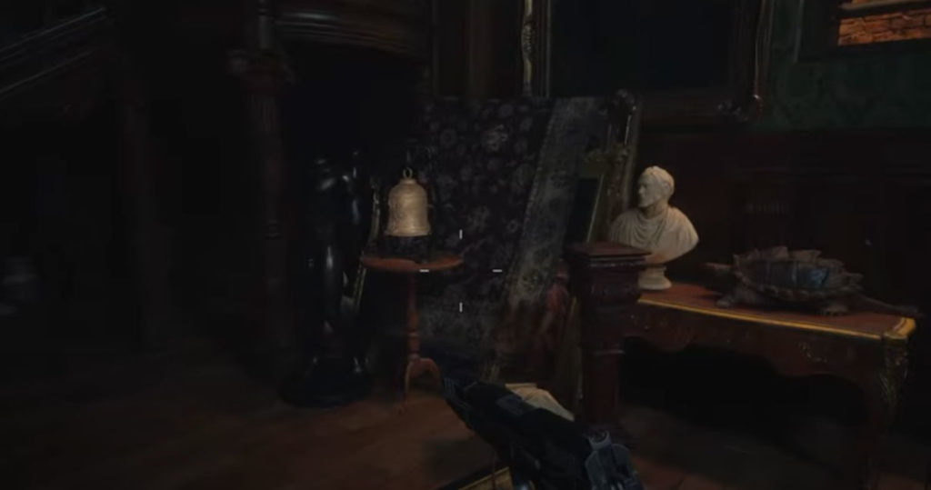 Comment résoudre le casse-tête des cinq cloches dans Resident Evil Village - Bell on the table