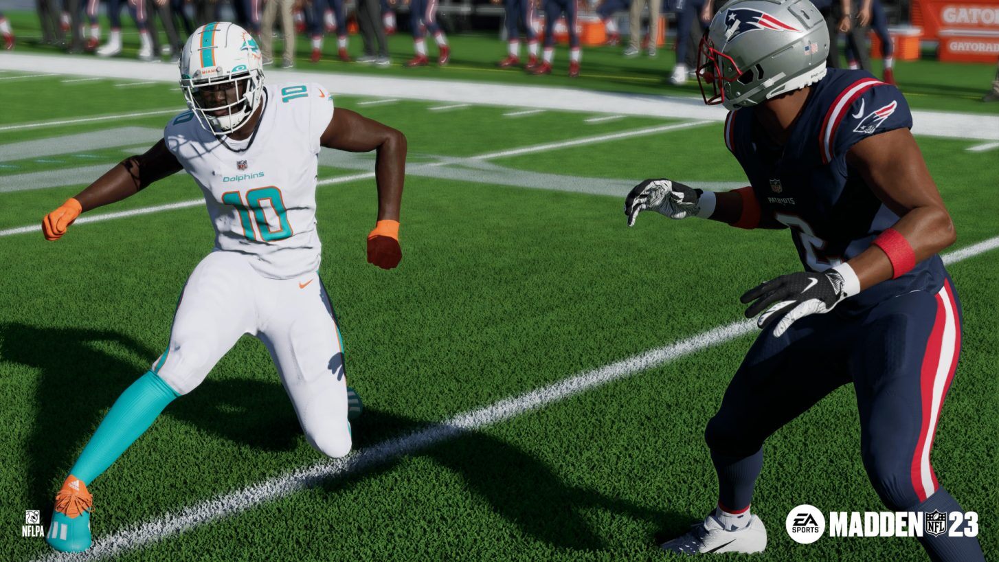 Madden nfl 23 capture d'écran des dauphins tyreek hill éjectant le défenseur