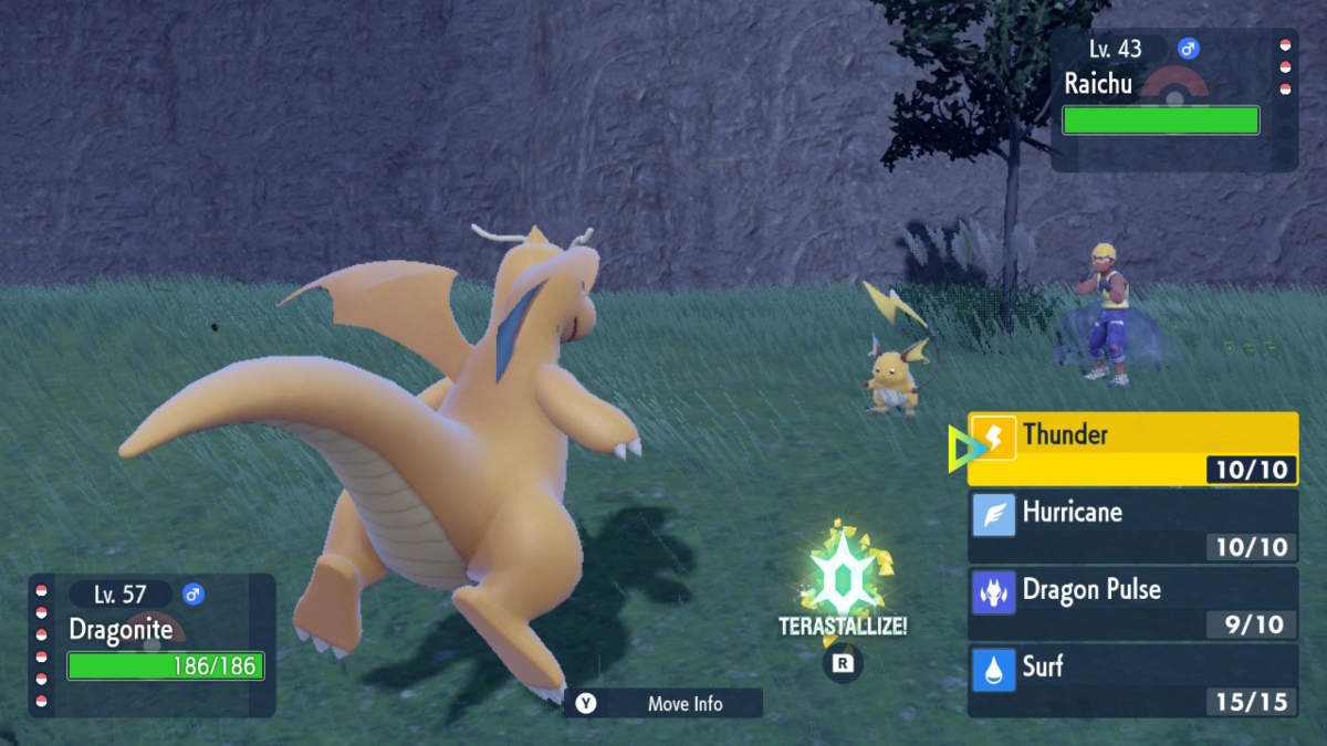une créature jaune ressemblant à un dragon affronte une créature jaune ressemblant à une souris avec une longue queue.  sur la main gauche se trouve un menu de mouvements d'attaque 