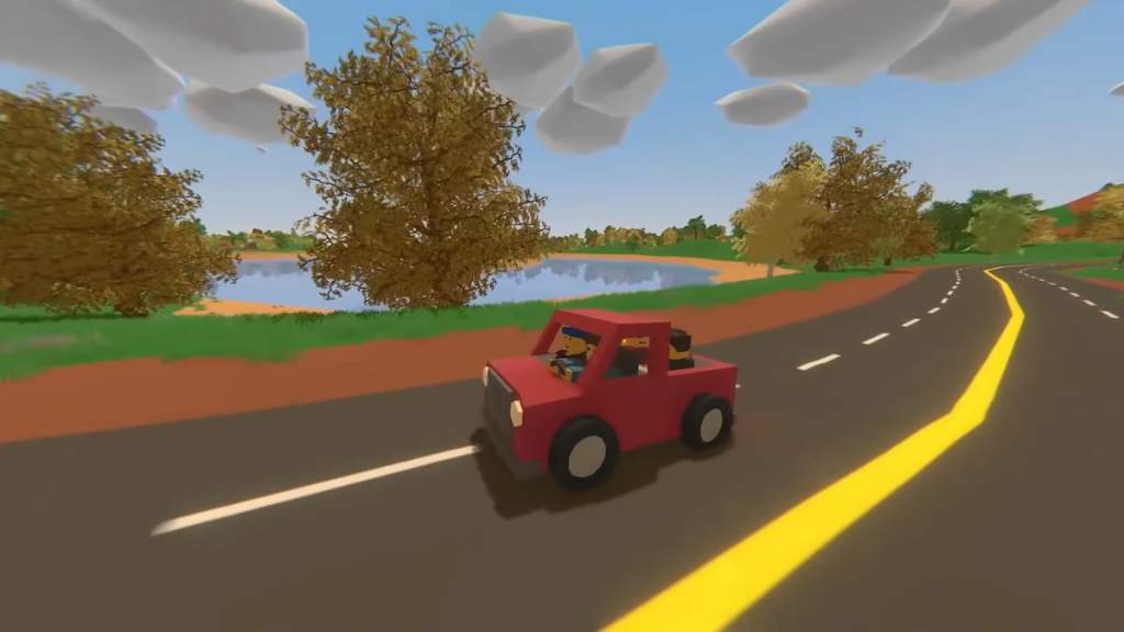 Une voiture rouge sur une route ouverte dans Unturned.