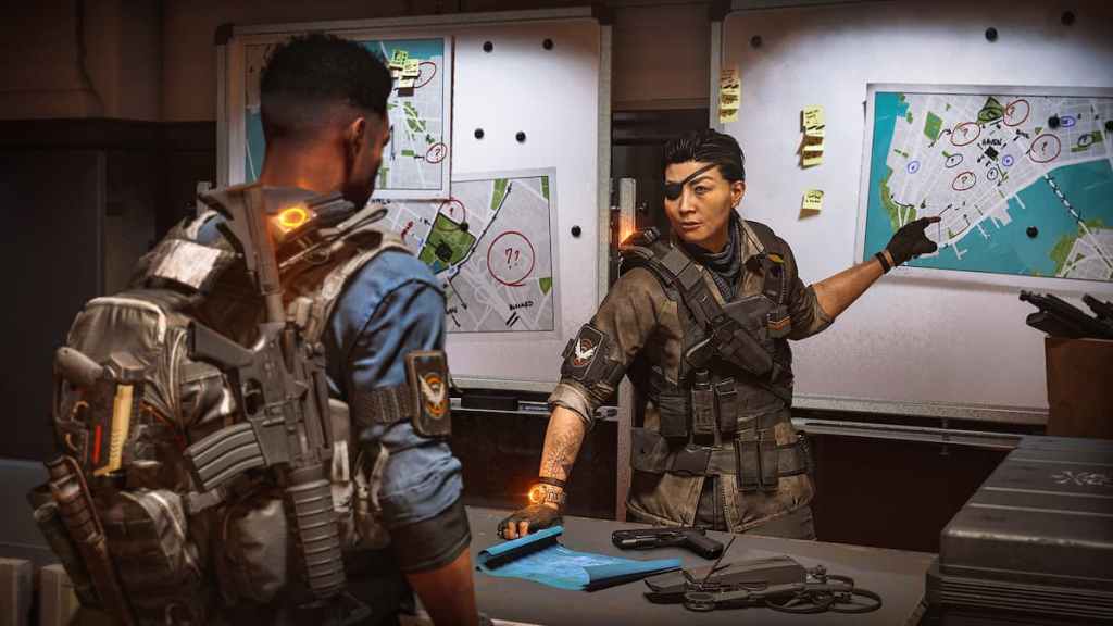 Un personnage informant un autre personnage d'une mission dans The Division 2